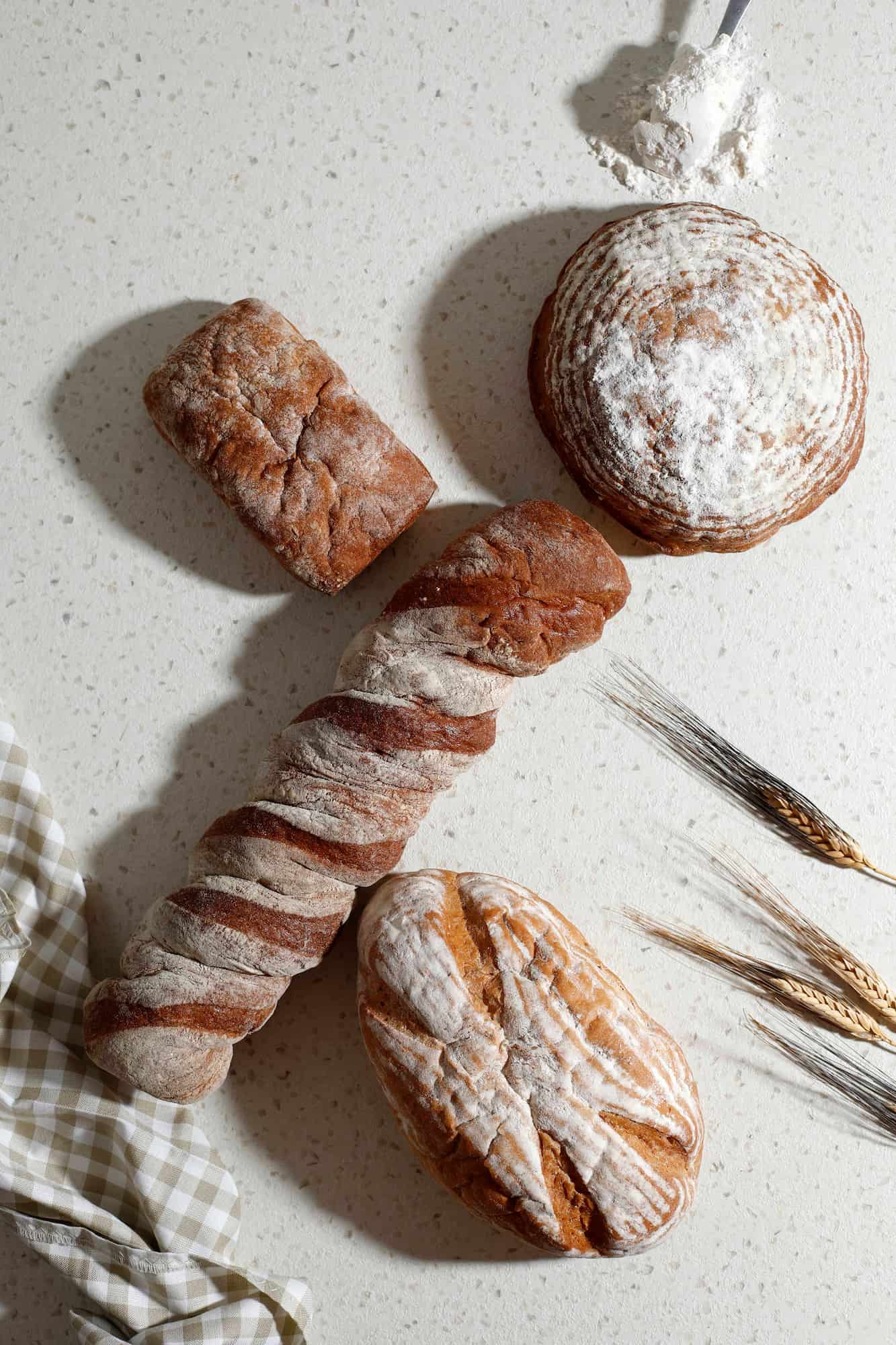 image-UZMPVMN.jpg Bread dough preparation on a floured worktop